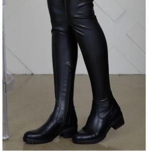 Thigh high flat boots